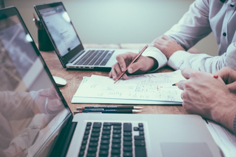 Person confidently managing tasks on a laptop